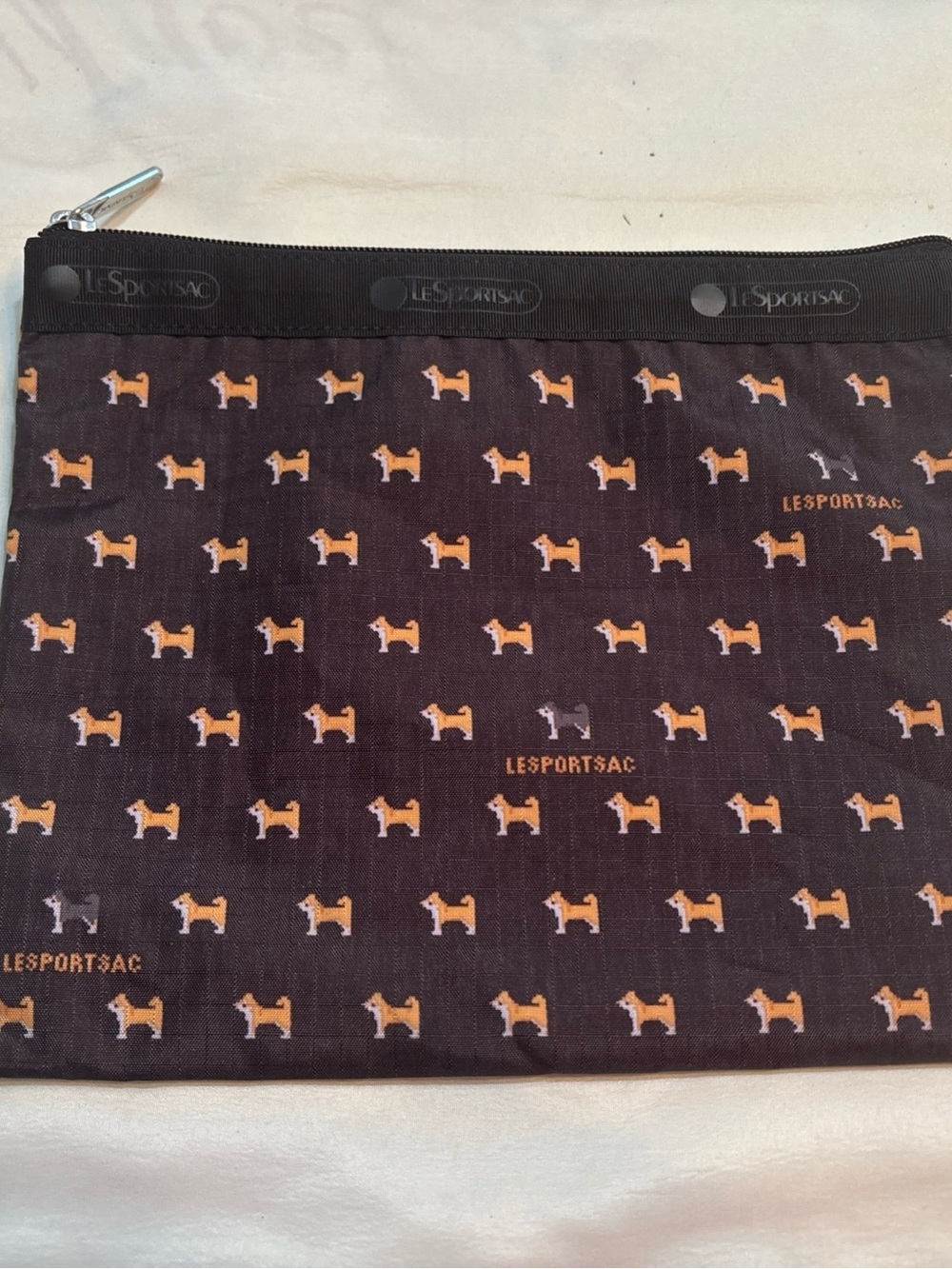 LeSportsac Black Toiletry Pouch with Orange Dog Print